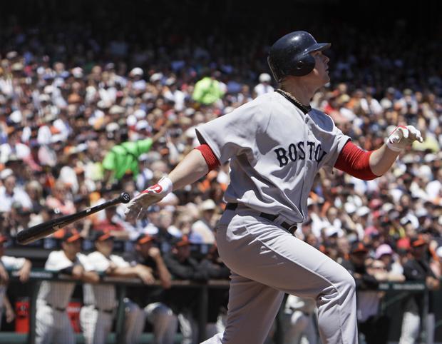 Boston's Jon Lester hits an RBI sacrifice fly off San Francisco starting pitcher Tim Lincecum during the second inning of the game in San Francisco on Sunday. Lester was the Red Sox starting pitcher in the game. (AP)