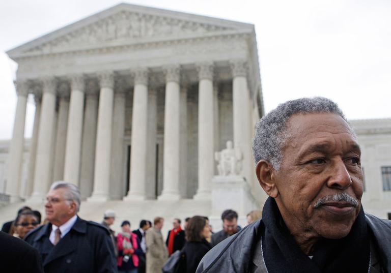 Otis McDonald, right, one of four plaintiffs in the Chicago handgun ban, takes part in a news conference in front of the Supreme Court in Washington on March 2. McDonald said he joined a federal lawsuit to challenge Chicago's 28-year-old handgun ban because he wants a handgun at home to protect himself from gangs. (AP)