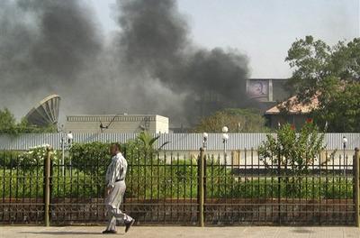 Black smoke was recently seen coming from the intelligence services building that came under attack in the southern port city of Aden, in Yemen. (AP)