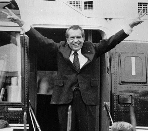 Richard Nixon says goodbye outside the White House as he boards a helicopter after resigning the Presidency in this Aug. 9, 1974 file photo. (AP)