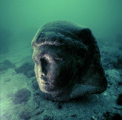 This granite head (80cm) is attributed to Caesarion (Ptolemaios XV), son of Cleopatra VII and Julius Caesar. It is part of a statue of about 5 metres in height and dates from the 1st century BC. It was found in Alexandria&#039;s ancient harbour opposite the island of Antirhodos. (Franck Goddio / Hilti Foundation, Photo: Christoph Gerigk)