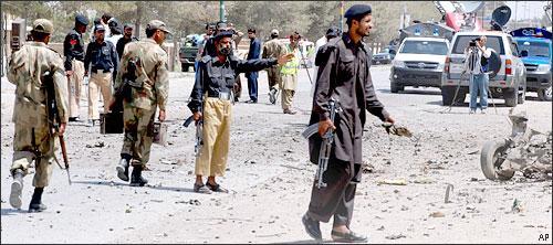 Pakistan police and army soldiers at the site of a bomb blast in Quetta, Pakistan, June 20, 2010. (AP)