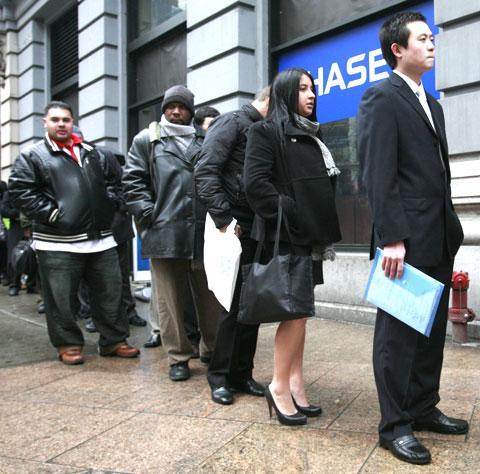 People wait in a line to enter a job fair, Wednesday, Feb. 24, 2010 in New York (AP)