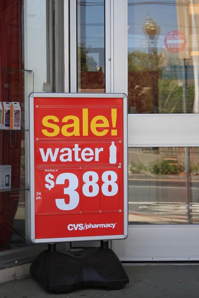 A Commonweath Avenue CVS advertised water as the temperature climbed. (Jeff Carpenter for WBUR)