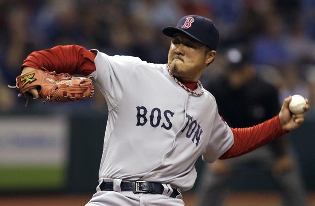Boston relief pitcher Hideki Okajima delivers in the eighth inning to Tampa Bay during the game on Tuesday in St. Petersburg, Fla. Tampa Bay won 3-2. (AP)