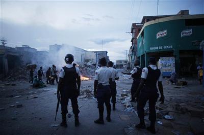 Police patrol in downtown Port-au-Prince, Haiti in July.  (AP)