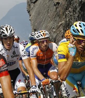 From left to right- Andy Schleck of Luxembourg, Denis Menchov of Russia, and Alberto Contador of Spain climb the Aubisque pass during the 16th stage of the Tour de France. (AP)