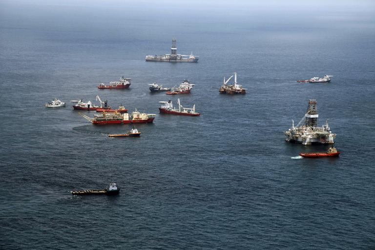 Authorities will decide Thursday night if weather will force the dozens of ships aiding in the oil spill clean up to leave the area. (AP)