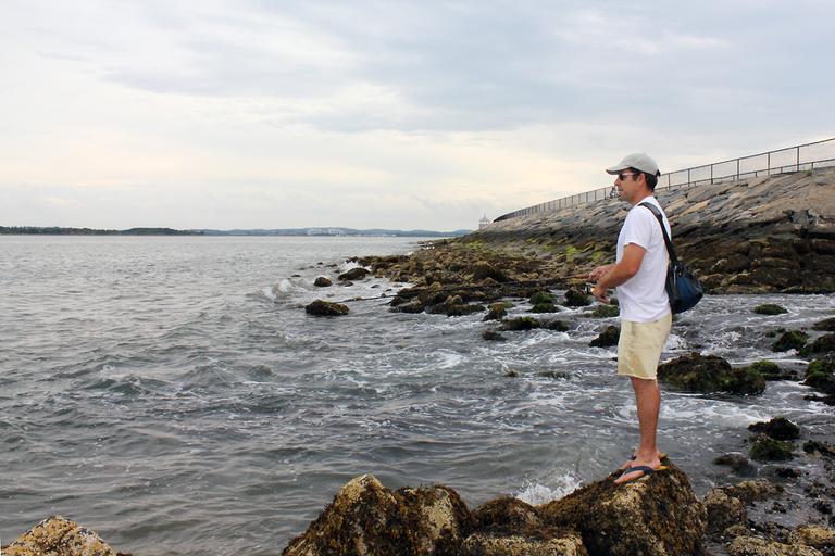 Andrew Mowbray, an artist in Dorchester, walks down to fish on Castle Island three to four times a week. (Lisa Tobin/WBUR)