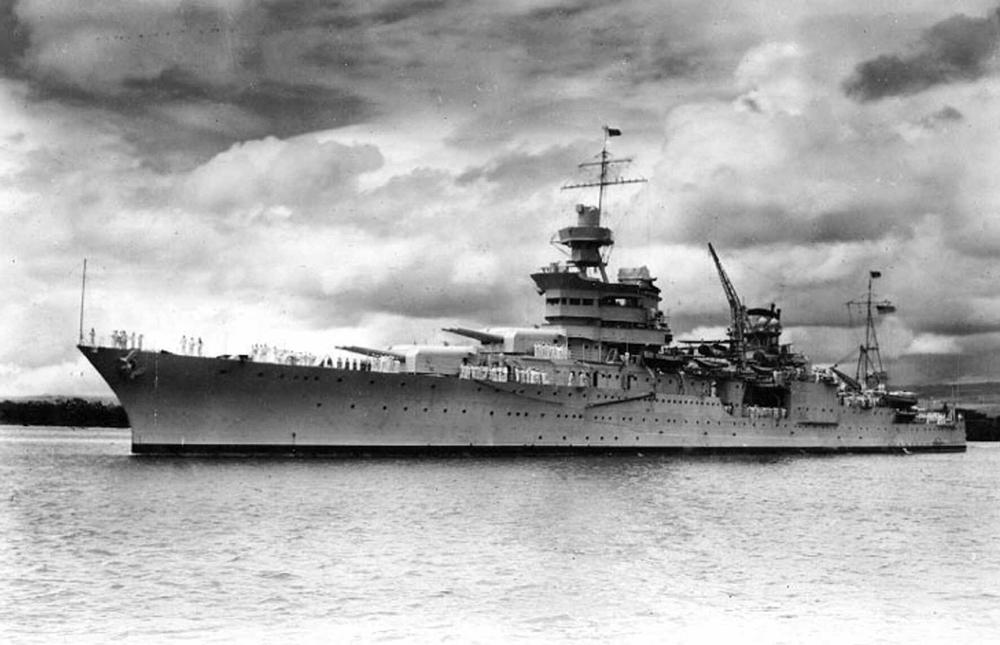 The USS Indianapolis at Pearl Harbor, Hawaii, circa 1937.  On July 30, 1945, a Japanese submarine torpedoed the Indianapolis, tearing the ship nearly in two, destroying much of the bow and igniting a firestorm below decks. Within 12 minutes, the vessel was gone and 300 crewmen were dead.  (Naval Historical Center via AP)