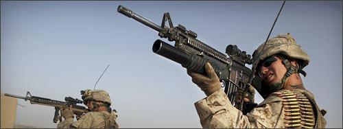 United States Marine scan the horizon for militants near Musa Qaleh, in northern Helmand Province, Afghanistan. (AP)