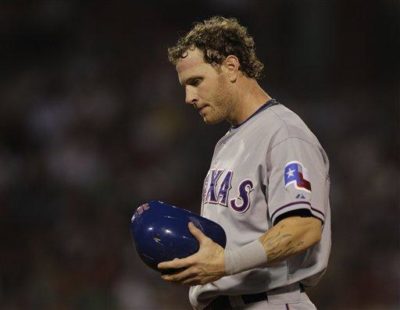 Josh Hamilton and the Texas Rangers could be playing in the World Series in October, but who will own the team? (AP Photo/Charles Krupa)