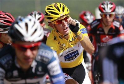 Andy Schleck of Luxembourg, wearing the overall leader&#039;s yellow jersey, rides in the pack during the 11th stage of the Tour de France Thursday, July 15, 2010. (AP Photo/Bas Czerwinski)