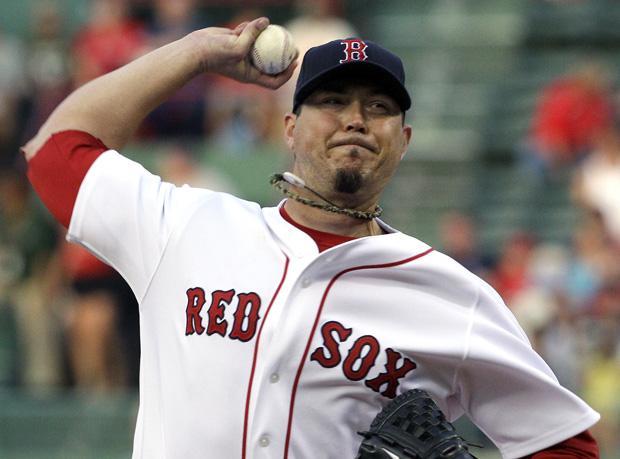 Boston starting pitcher Josh Beckett throws to a Cleveland batter in the first inning during the game in Boston on Tuesday. (AP)