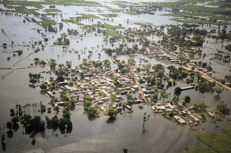 An aerial view of houses submerged in floodwater in Mithan Kot, in central Pakistan, on August 9, 2010. (AP)