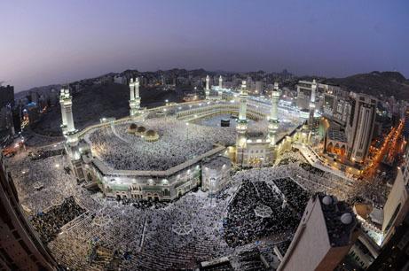Hundreds of thousands of Muslims pilgrims circle the Kaaba around the Grand Mosque during the last week of Ramadan in Mecca, Saudi Arabia, in 2009. (AP)