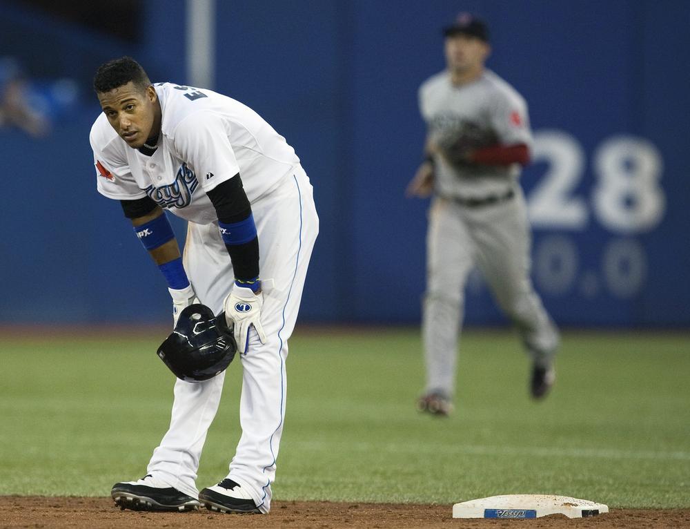 Toronto shortstop Yunel Escobar looks on after being forced out at second base to end the fourth inning against Boston during the game in Toronto on Wednesday. (Canadian Press/AP) 