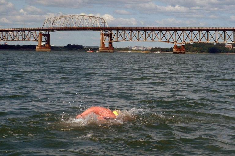 Elaine Howley swims near the harbor's Long Island Bridge in 2006. (Courtesy Elaine Howley)