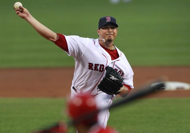 Boston starter Josh Beckett delivers against Los Angeles during the first inning of the game in Boston on Thursday. (AP)
