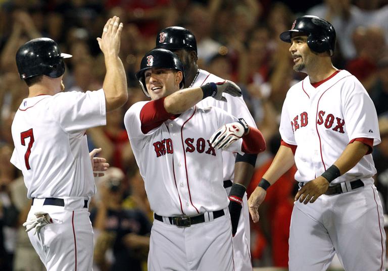 The Red Sox celebrate Ryan Kalish&#39;s grand slam in the team&#39;s win over the LA Angels on Tuesday. (AP)