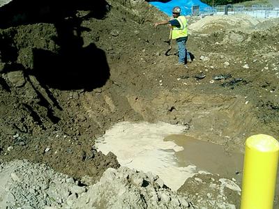 MWRA investigates a small water leak in Weston, near May's catastrophic leak site. (Steve Brown/WBUR)