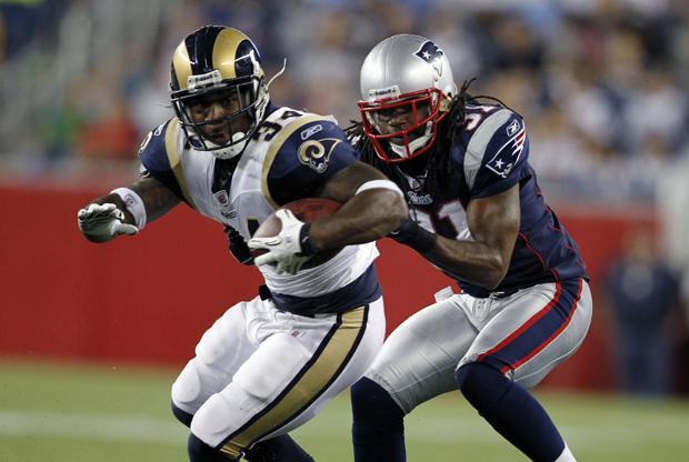 New England safety Brandon Meriweather tackles St. Louis running back Kenneth Darby in the first half of an NFL preseason football game on Thursday in Foxborough, Mass. (AP)