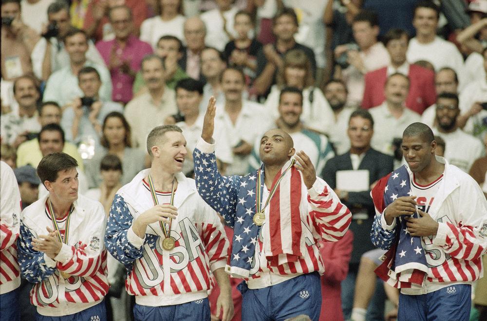 The 1992 USA Olympic basketball team rejoices after winning the gold-medal game against Croatia. (AP)
