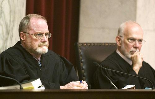 West Virginia judges rehear a case after photos surfaced showing a state Supreme Court Justice vacationing with a person involved in a pending case. Judicial elections in West Virginia have remained controversial, with one disputed election leading to a U.S. Supreme Court ruling. (AP)