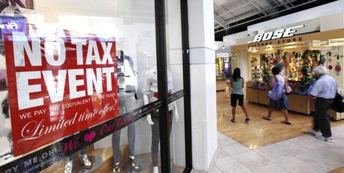 Shoppers stroll through Sawgrass Mills Mall during the first day of the back-to-school sales tax holiday, Aug. 13, 2010 in Sunrise, Fla. (AP)