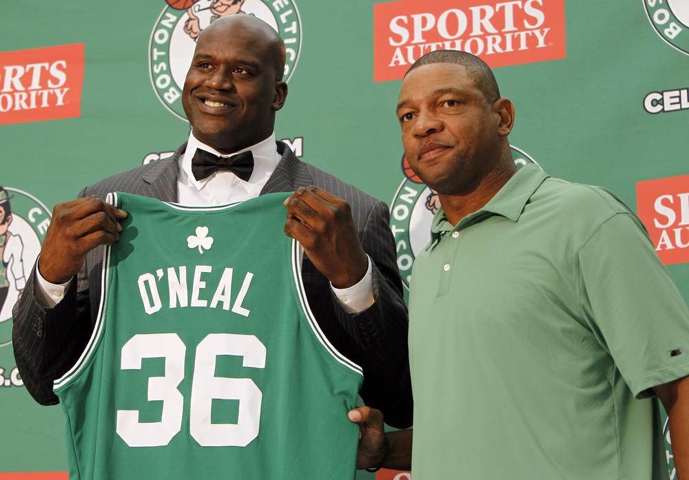 Given his recent spate of injuries, Boston Celtics coach Doc Rivers (r) probably wishes Shaquille O'Neal's number matched his age, but the big man is 39. (AP)