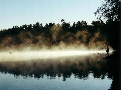 Walden Pond at sunrise. (Storm Crypt/Flickr)