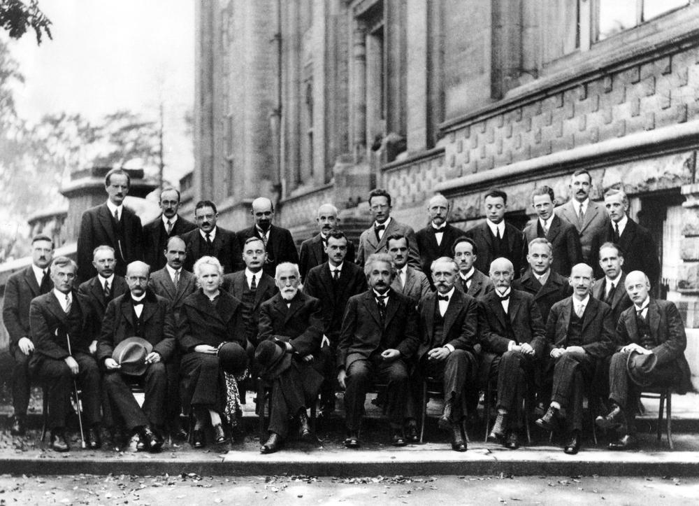 This is from the famous 5th Solvay Conference in Belgium, which brought together the greatest scientists of the world. Madame Curie is third from the left in the front row. (Institut International de Physique Solvay)