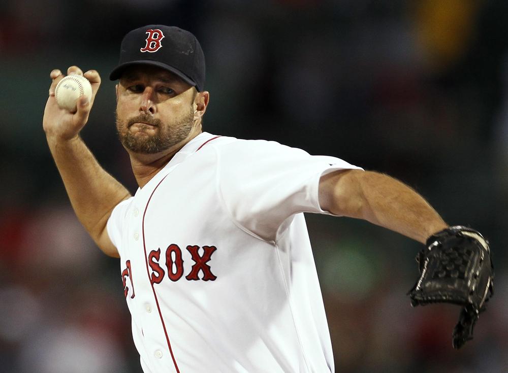 Boston starting pitcher Tim Wakefield delivers a knuckleball against Tampa Bay during the first inning of the game in Boston on Wednesday. (AP)