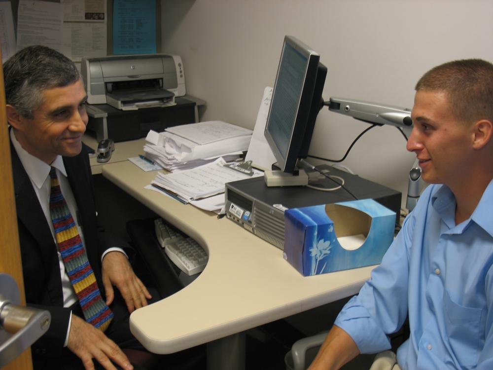 Jon Zagami meets with his psychiatrist Dr. Kaloyan Tanev at Mass General. (Photo by WBUR)