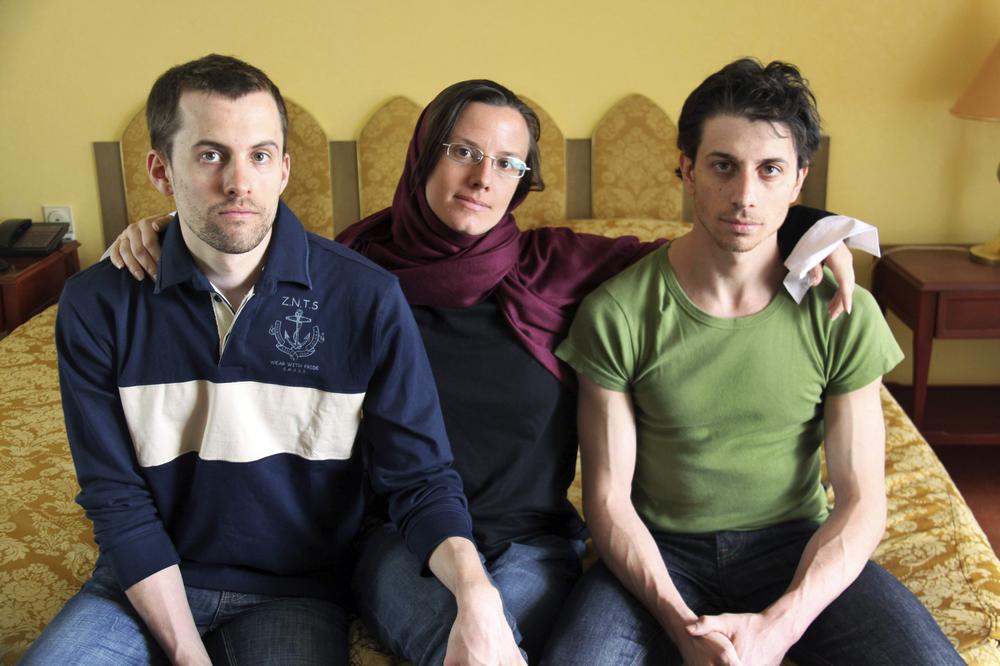 In this May 20 file photo, American hikers Shane Bauer, left, Sarah Shourd, center, and Josh Fattal, sit at the Esteghlal Hotel in Tehran, Iran.  (AP Photo/Press TV, File)