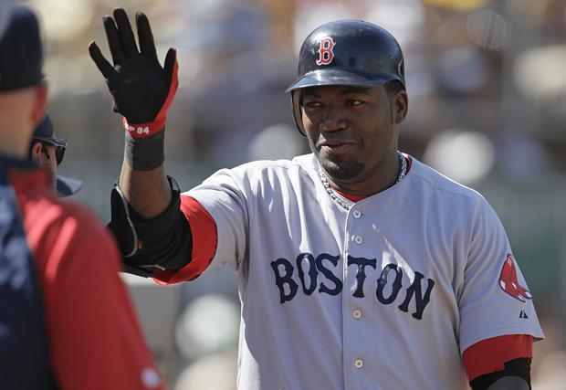 Boston Red Sox's David Ortiz celebrates after scoring against the Oakland Athletics during the sixth inning of a baseball game Sunday, Sept. 12, 2010, in Oakland, Calif. Ortiz scored on a two-run double by teammate J.D. Drew. (AP)
