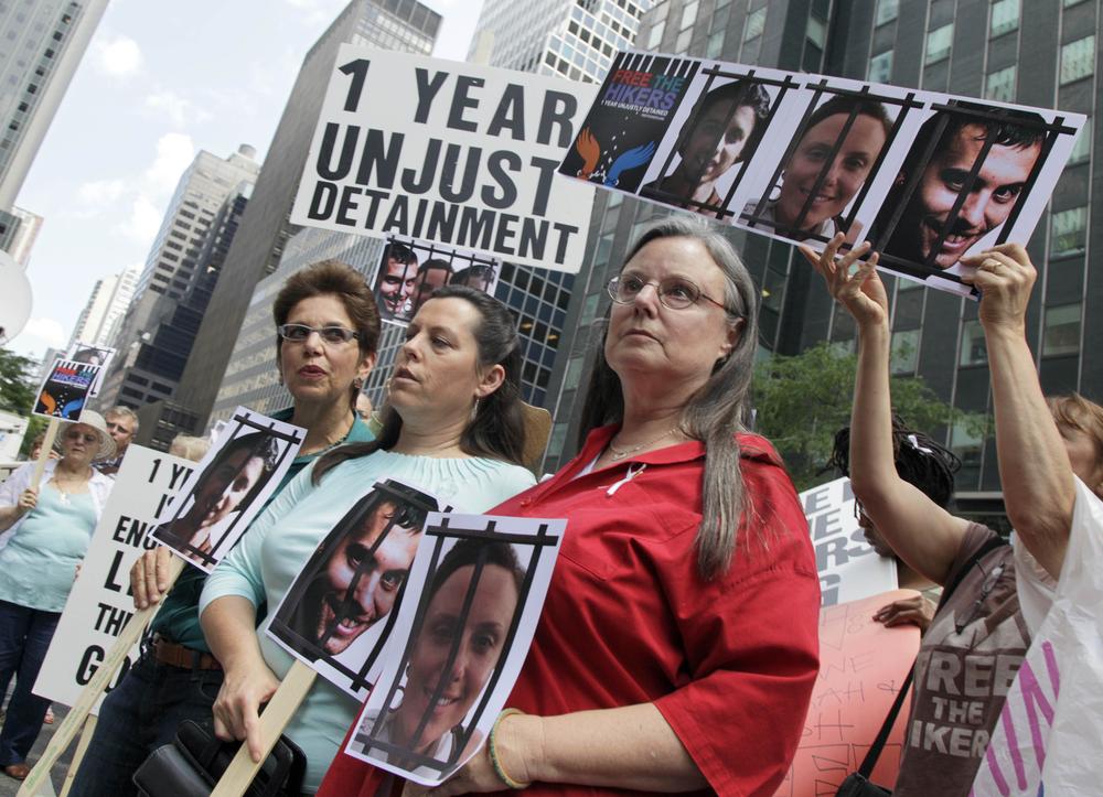 Laura Fattal, left, Cindy Hickey, and Nora Shourd, mothers of three American hikers jailed in Iran, participate in a demonstration outside Iran&#039;s mission to the United Nations. (AP)