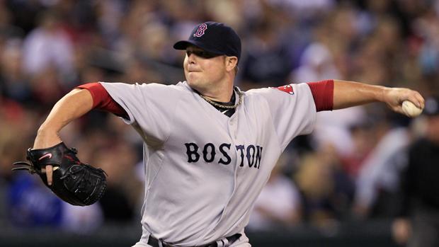 Boston Red Sox starting pitcher Jon Lester throws against the Seattle Mariners in the fifth inning during a baseball game, Monday, Sept. 13, 2010, in Seattle. The Red Sox won 5-1. (AP)