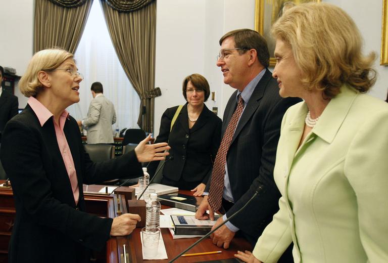 Dr. Elizabeth Warren, then chair of the Congressional Oversight Panel, left, speaks to members of the Joint Economic Committee on Capitol Hill in Washington. (AP)