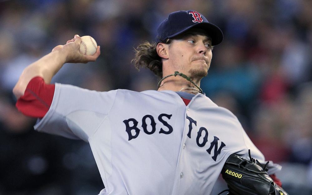 Boston Red Sox starting pitcher Clay Buchholz throws against the Seattle Mariners in the first inning during a baseball game Wednesday, Sept. 15, 2010, in Seattle. (AP)