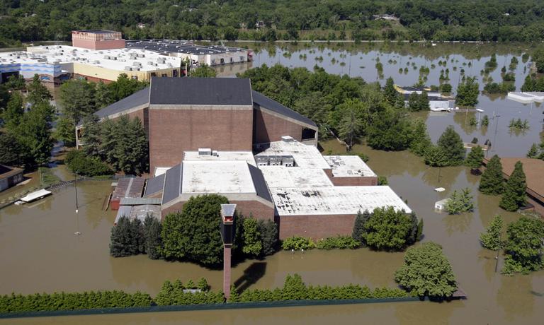 The Grand Ole Opry House and the Opry Mills Mall surrounded by floodwaters in May. (AP)