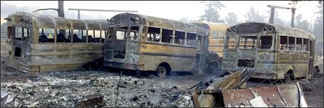 Buses destroyed by a wild fire, Gold Hill, Colo. (AP Photo/Eric Peter Abramson)