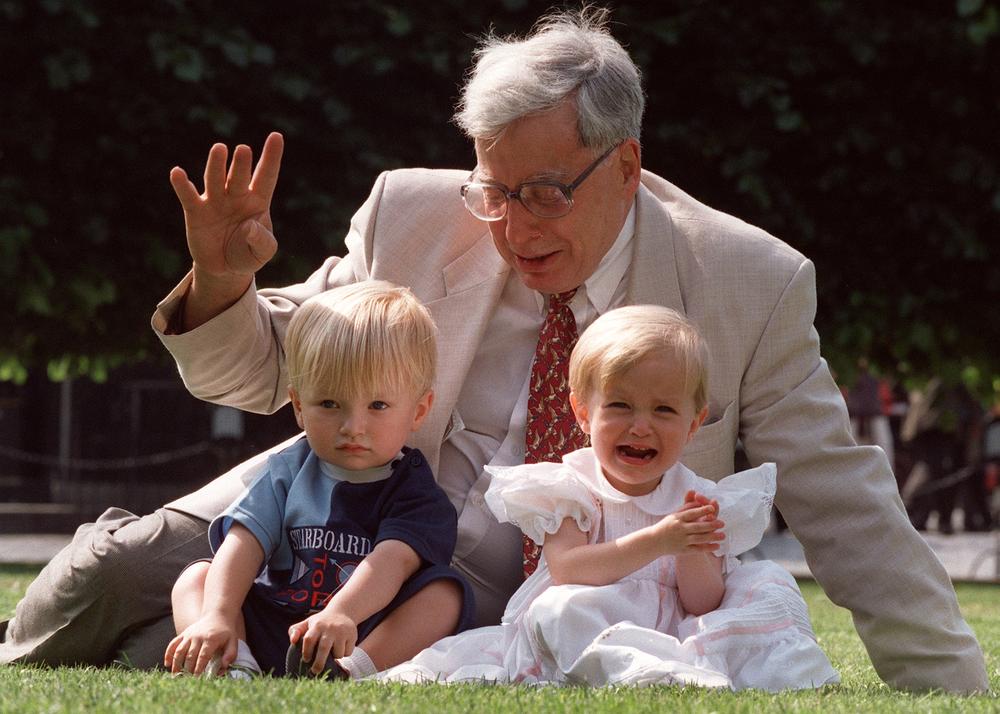 Robert Edwards, the British pioneer of IVF treatment, sits with two of his &#039;test-tube-babies&#039;, Sophie and Jack Emery who celebrate their second birthday in London in this 1998 file photo. (AP)