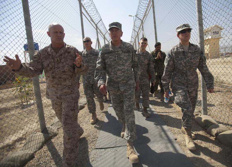 The top American commander in Afghanistan Gen. David Petraeus, center, tours the grounds of the U.S.-run Parwan detention facility near Bagram north of Kabul, Afghanistan, in September. (AP)