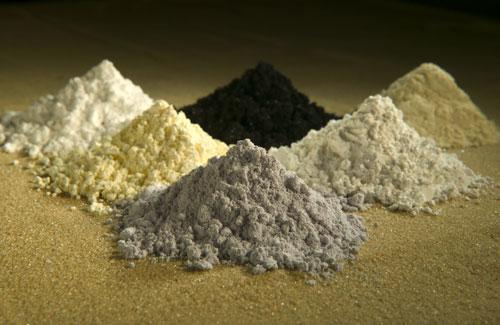 Rare-earth oxides . Clockwise from top center: praseodymium, cerium, lanthanum, neodymium, samarium, and gadolinium. (U.S. Agriculture Dept.)