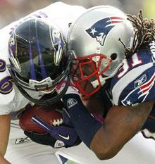 A penalized hit during a Ravens vs. Patriots game, Oct. 17, 2010 (AP)