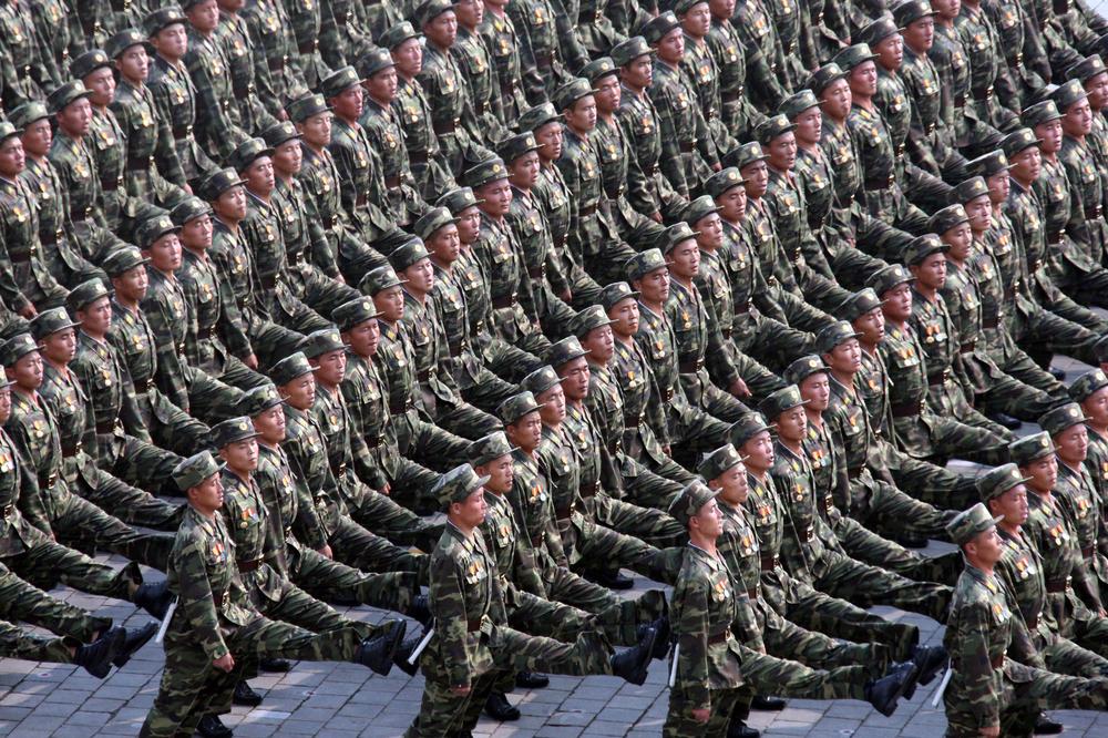 In this photo released by China's Xinhua news agency, North Korean soldiers march during a massive military parade on Sunday. (AP Photo/Xinhua, Yao Dawei)