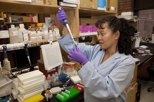 Pamela Moy, an associate scientist at ALS Therapy Development Institute, works in the Cambridge lab. Her work is partially funded by an earmark. (Courtesy of Jeff Dunn Photography)