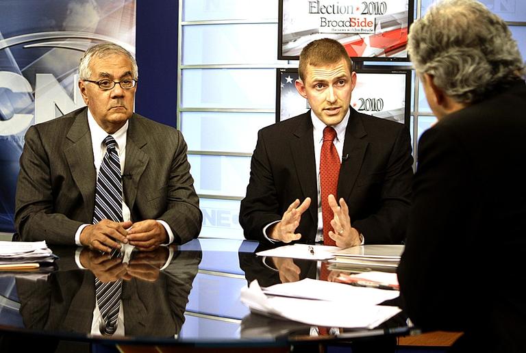 Democrat Rep. Barney Frank, left, and Republican challenger Sean Bielat, center, debate on October 11. (AP)