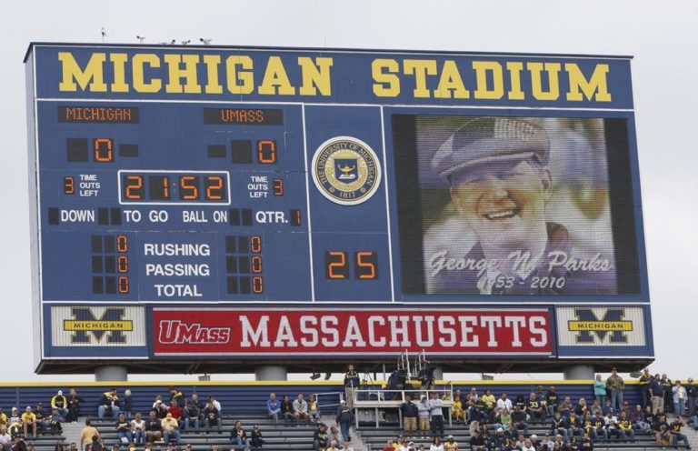 A tribute to George Parks on the Michigan scoreboard before the start of the football game against UMass Amherst. (AP)